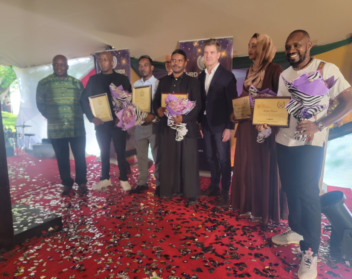 Activists Hanifa Adan, Boniface Mwangi and Hussein Khalid at the Danish Embassy in Nairobi on Friday, November, 29, 2024, receiving the Human Rights Defenders of the Year award. PHOTO/@Honeyfarsafi/X
