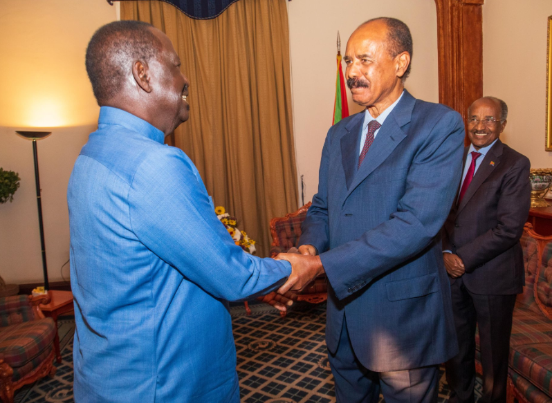 Raila greeting Eritrean president Afwerki. PHOTO/@@RailaOdinga/X
