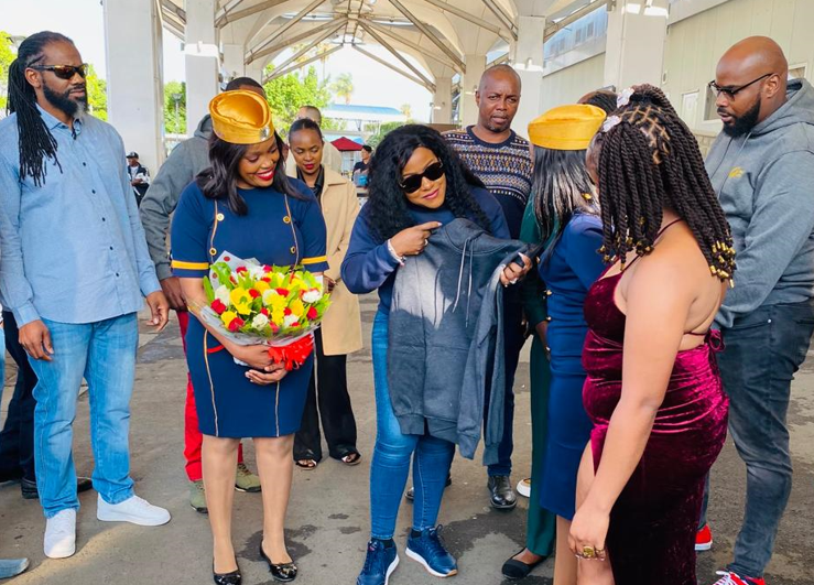 Jamaican artiste Etana being received at JKIA by the Mediamax Network Limited team on Wednesday, December 4, 2024. PHOTO/K24 Digital
