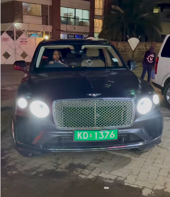 Millicent Omanga test-driving her latest acquisition, a Bentley Bentayga. PHOTO/Screengrab by K24 Digital
