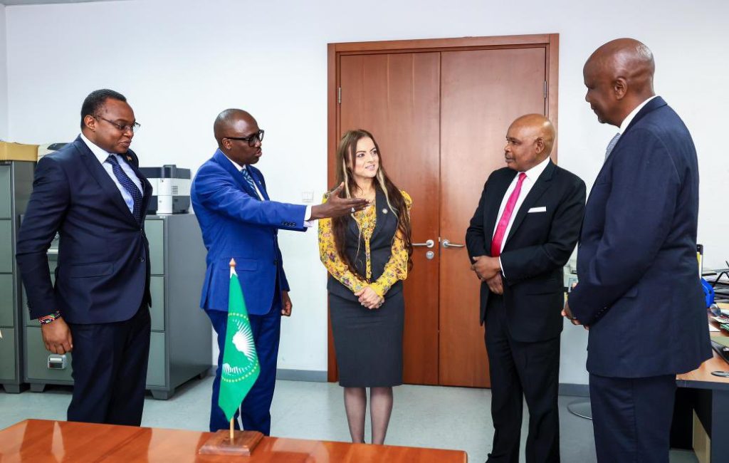 Makau Mutua (in read tie) engaging with PS Korir Sing'oei (in blue suit) while submitting Raila's candidature in Addis Ababa on July 29, 2024.