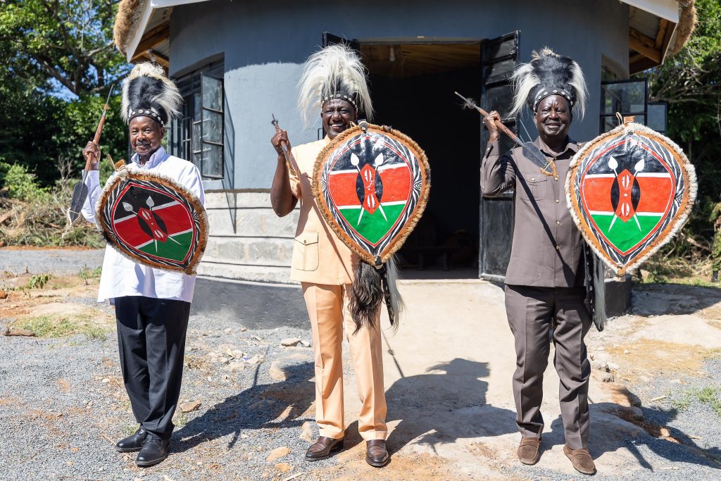 L-R: President Yoweri Museveni, President William Ruto and Raila Odinga pose with arrows and shields at the Piny Luo cultural event in Siaya County on January 2, 2025. PHOTO/@KagutaMuseveni/X