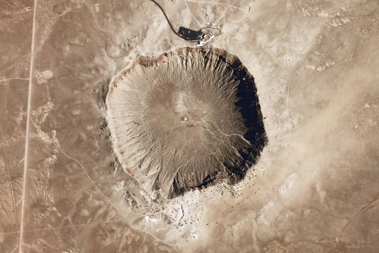 Satellite photo of a large rocky crater.