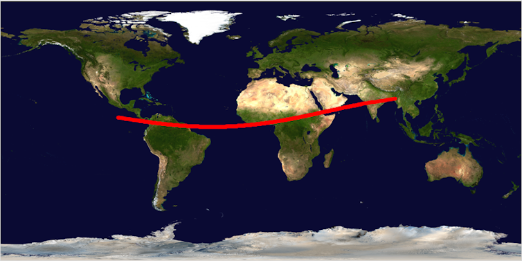 A map of Earth showing a red streak stretching from Central America to Southeast Asia.