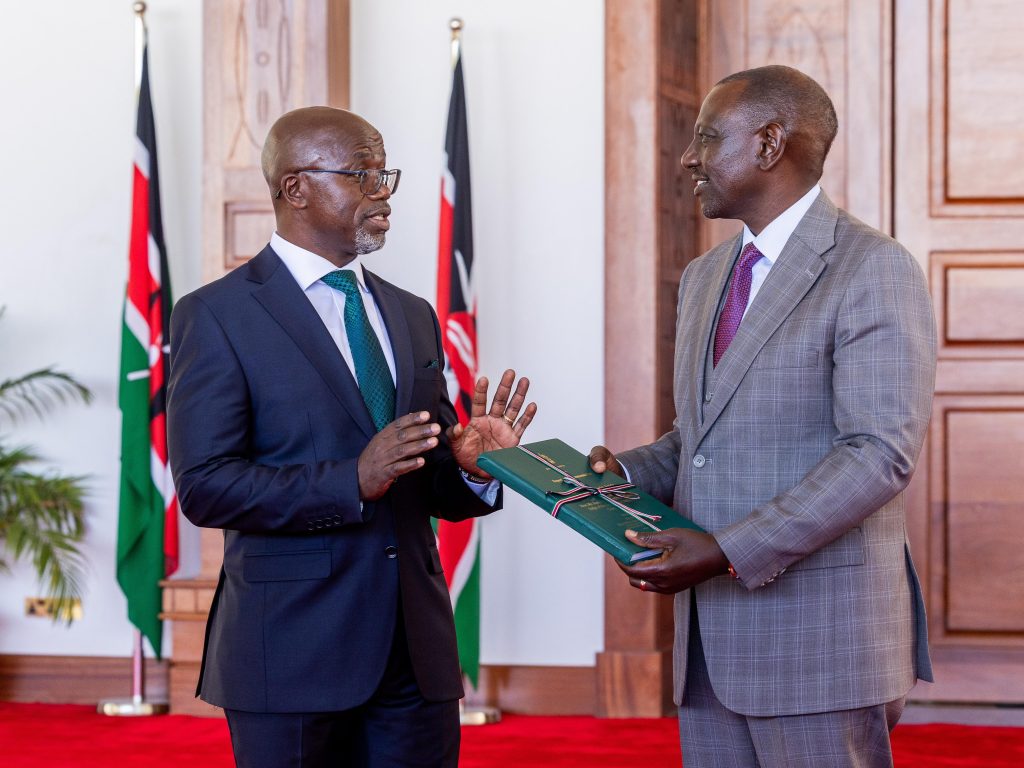 President William Ruto receives the report of the tribunal investigating Justice Mohammed Noor Kullow from Justice Patrick Kiage, the chairperson of the tribunal and judge of the Court of Appeal on Monday February 3, 2025. PHOTO/PCS